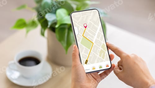 Preview: Cropped of woman using navigation mobile app on smartphone