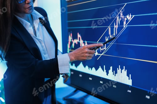 Preview: Business woman explaining trading strategies inside bank meeting room - Focus on hand