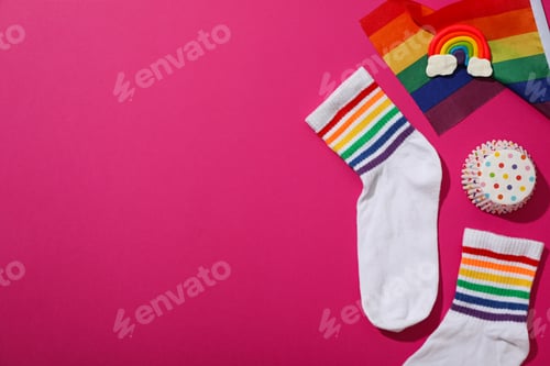 Preview: LGBT parade concept, holiday symbols on pink background.