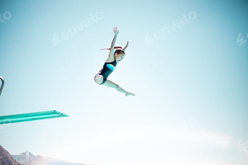 Preview: Kid jumping off a diving board at a community swimming pool