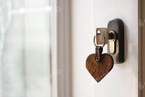 Preview: House key hanging from the doorknob.