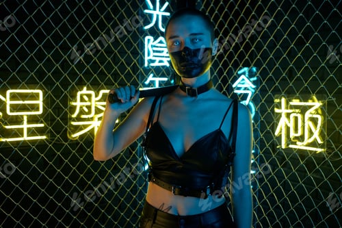 Preview: Young cyborg woman with black whip on shoulder