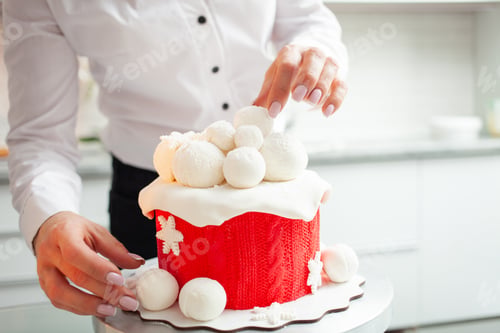 Preview: very beautiful winter cake for Christmas, New Year, holiday, birthday. Pastry chef decorates baking