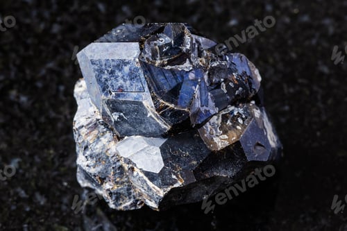 Preview: sample of rough black andradite garnet on black