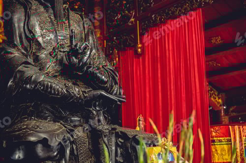 Preview: Buddhist idol Confucius inside a temple in Vietnam