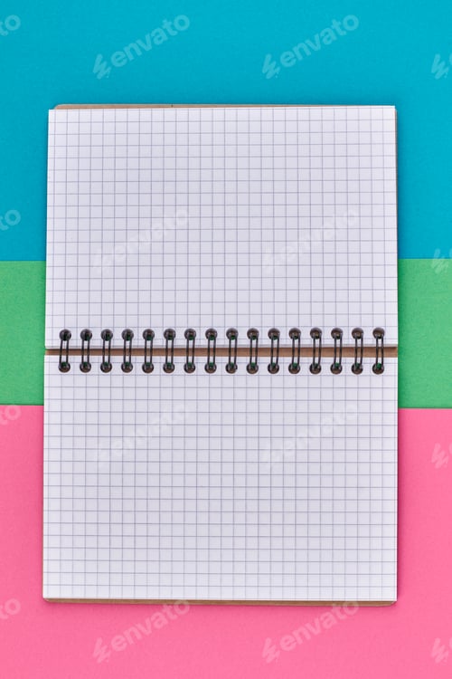Preview: Blank binder notebook on color background.