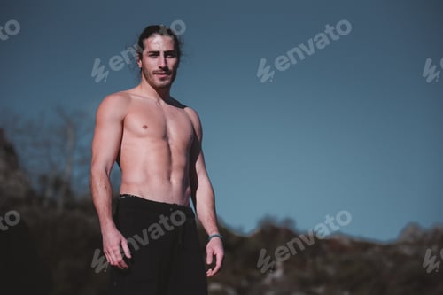 Preview: Handsome shirtless man in nature