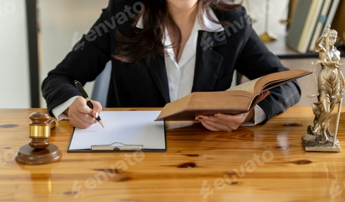 Preview: Justice and Agreement concept, Business advisor or Lawyers consultant working with contract in law f