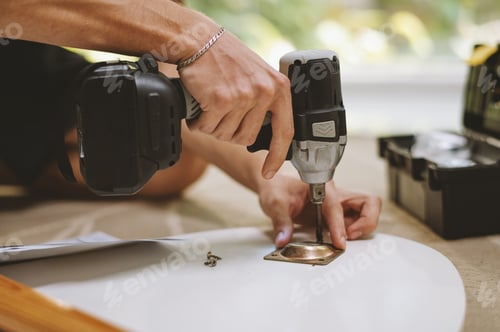 Preview: Man Assembling Coffee Table