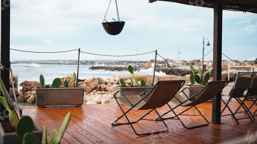 Preview: Sea view terrace with deck chairs