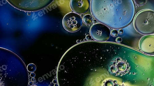 Preview: Abstract Colorful Food Oil Drops Bubbles and spheres Flowing on Water Surface