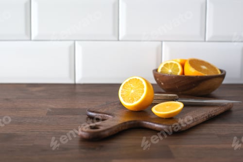 Preview: Lemon on a blackboard on a wooden countertop in the kitchen, minimalistic scandinavian interior