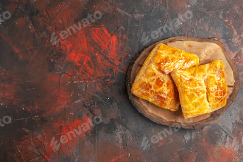 Preview: top view penovani khachapuri on wood board on dark red background with copy space