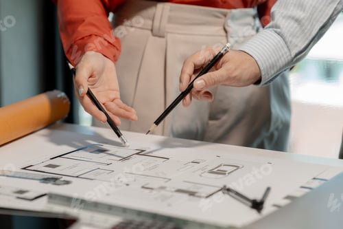 Preview: An engineer and an architect exchange information about a building they are about to build together
