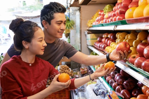 Preview: Happy couple buying groceries