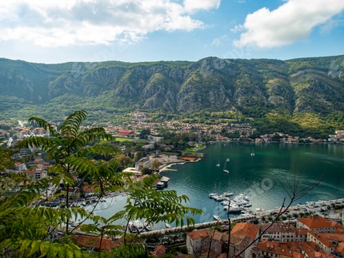Preview: Aerial photo of a bay with a small town with a port