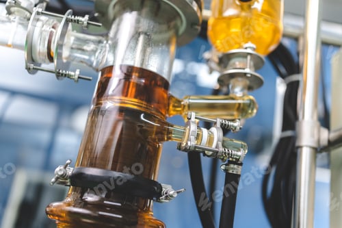 Preview: medical scientist with cannabis hemp research in medicine laboratory to make a herbal extract CBD