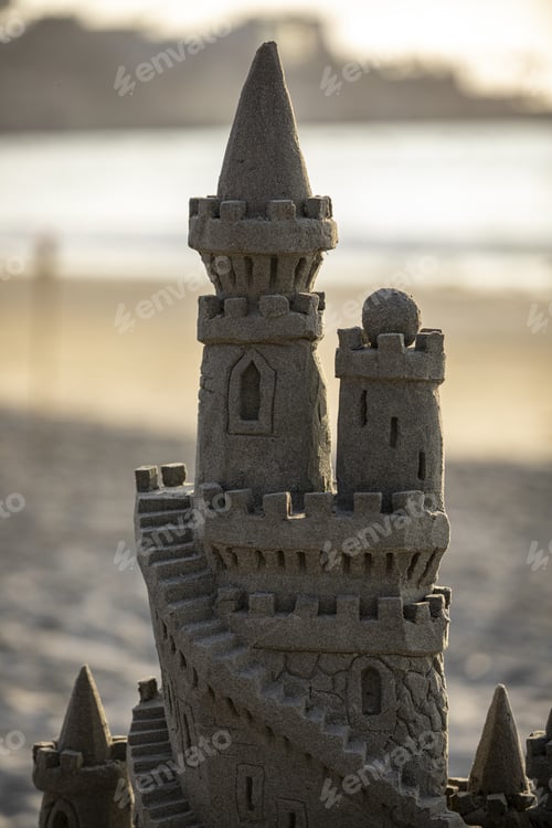 Preview: Vertical shot of a beautiful sandcastle by the ocean captured in San Diego