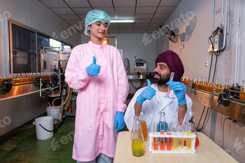 Preview: Beverage laboratory room worker in drink factory take product sample to tube and quality assurance