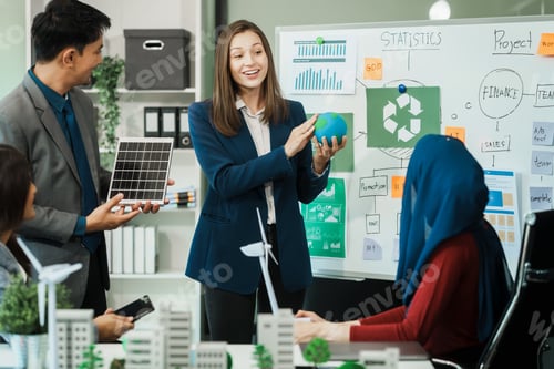 Preview: Diverse team, middle-aged Asian businessman, Caucasian young businesswoman, Muslim hijab-wearing
