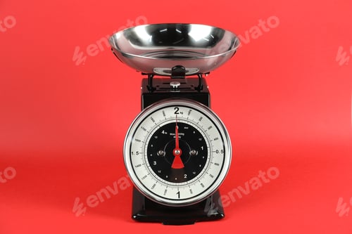 Preview: Mechanical kitchen scale with bowl on red background