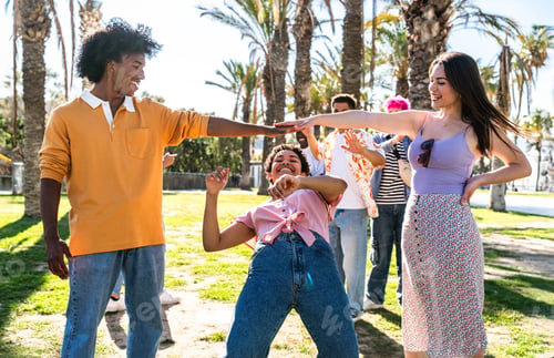Preview: Multiethnic group of young happy friends hanging out