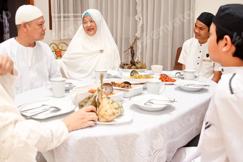 Preview: Family interaction, talking each other while enjoying special food at eid mubarak