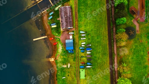 Preview: Top view shot of boathouse on the grass