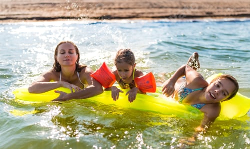 Preview: Happy mother and two small positive daughters