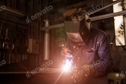 Preview: Welder soldering iron in workshop