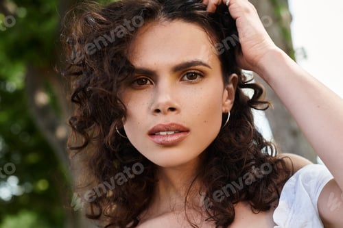 Preview: Radiating summer vibes with effortless style and natural beauty in a lush outdoor setting