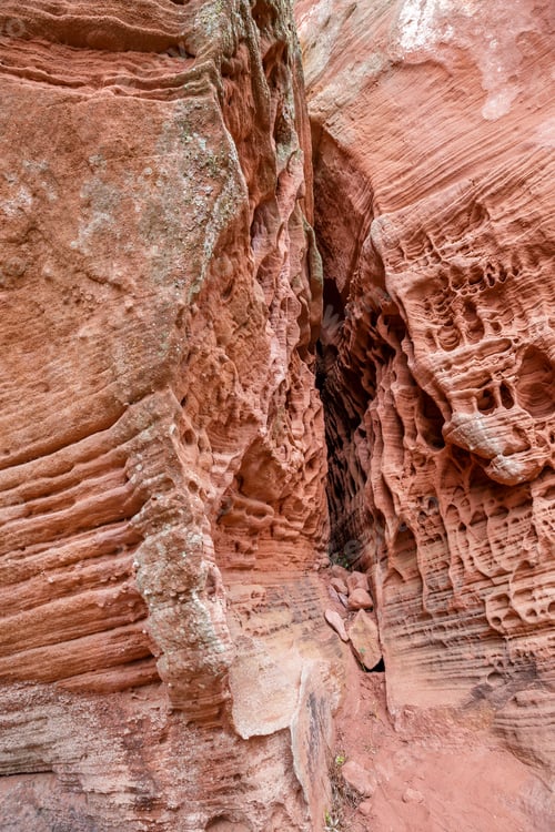 Preview: holes in stone - Tafoni weathering in red sandstone