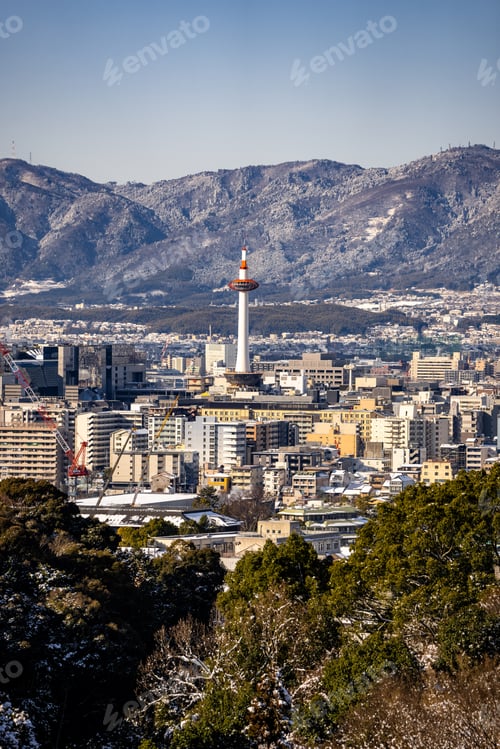 Preview: View of Nidec Kyoto Tower with the city skyline and mountains in the background. Kyoto, Japan