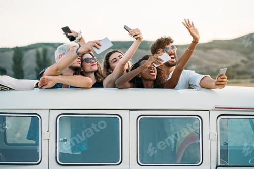 Preview: Friends taking selfie in van