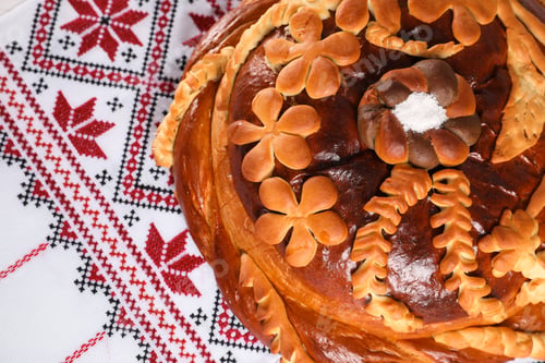 Preview: Korovai on rushnyk, above view. Ukrainian bread and salt welcoming tradition