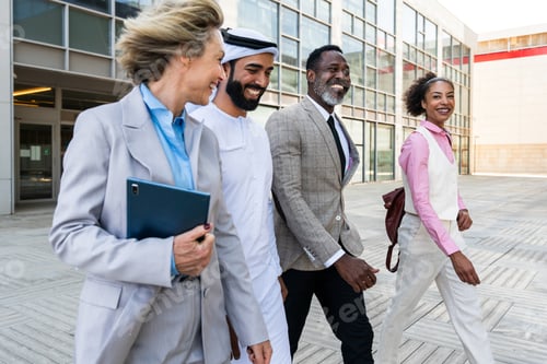 Preview: Group of multiethnic business people meeting an emirati businessman