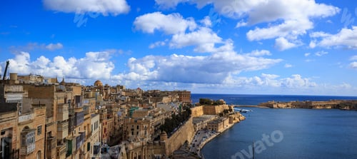 Preview: Malta, Valletta. Grand harbor in mediterranean. Blue sea and blue sky with few clouds background.