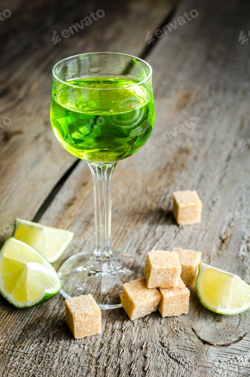 Preview: Glass of absinthe with lime and sugar cubes