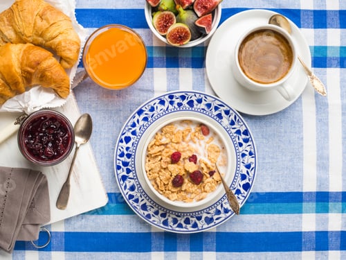Preview: Served breakfast with cereal, figs, croissant