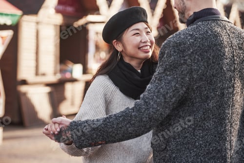 Preview: Lovely multiracial couple have a walk in the city and embracing each other