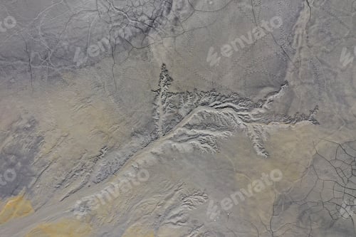 Preview: Abstract mud cracks and patterns aerial view