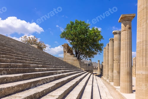Preview: Panoramic view of ruins of ancient city of Lindos on colorful island of Rhodes, Greece. Famous