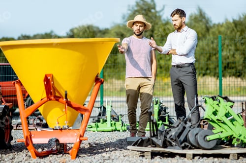 Preview: Agronomist with salesman at the agricultural shop