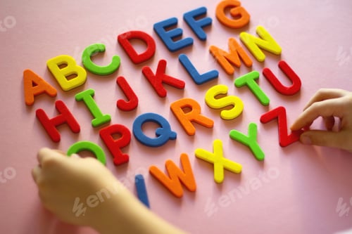 Preview: english alphabet. kid playing alphabet letters. Intellectual game, preschool primary education
