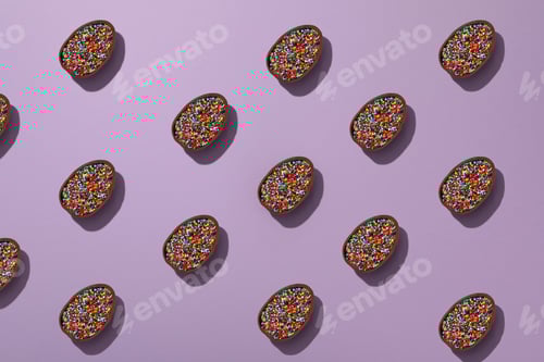 Preview: Chocolate egg with candies on a light background