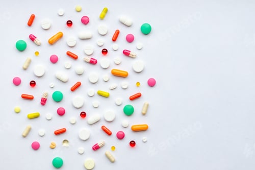 Preview: Many different pills and space for text on colorful background, top view. Different pills