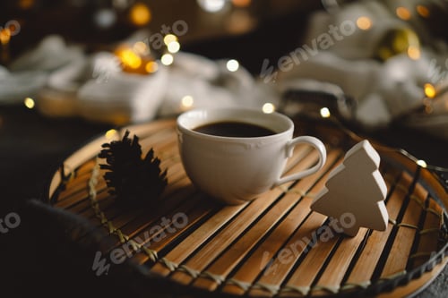 Preview: Christmas cup of coffee with sweater and Christmas decorations.