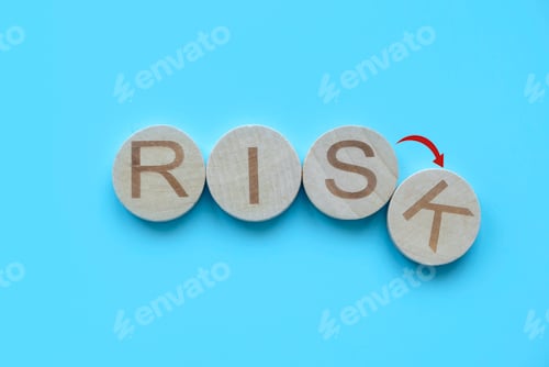 Preview: Risk concept. Wooden alphabet of word risk.