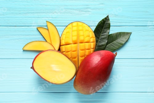 Preview: Flat lay composition with mango on color wooden background