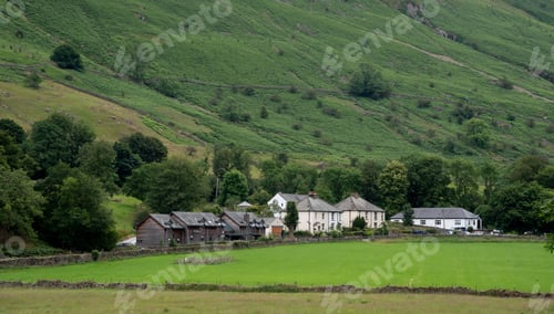 Preview: Cottage houses at the edge of the cliff e farmland Lake District United Kingdom
